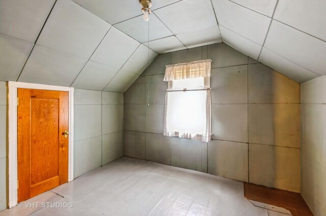 additional living space with lofted ceiling