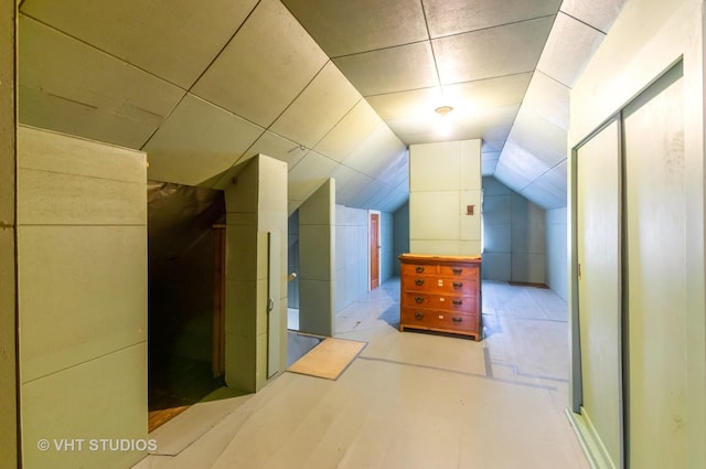 bonus room with vaulted ceiling