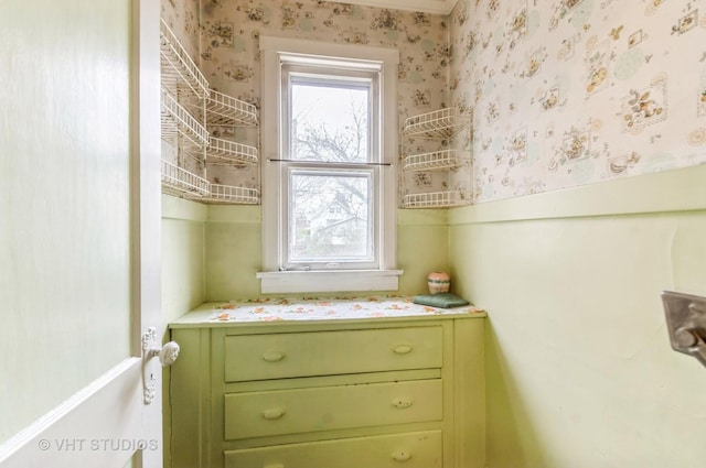 interior space featuring wallpapered walls