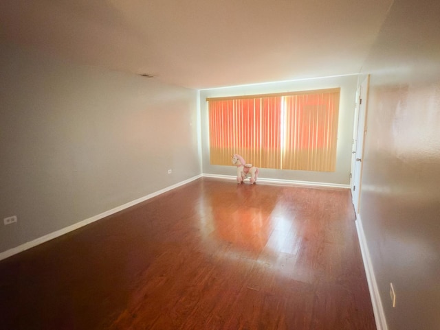 392 Luella Ave, Calumet City, IL 60409 - empty room with baseboards and wood finished floors