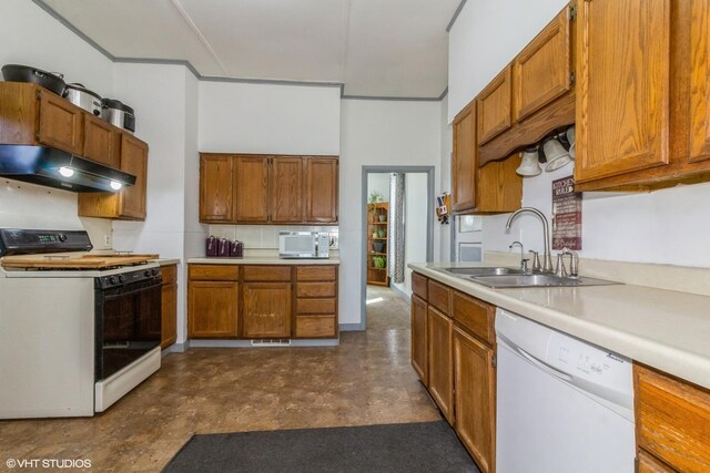 514 W Prairie St, Kirkland, IL 60146 - kitchen featuring gas stove, under cabinet range hood, brown cabinets, dishwasher, and a sink