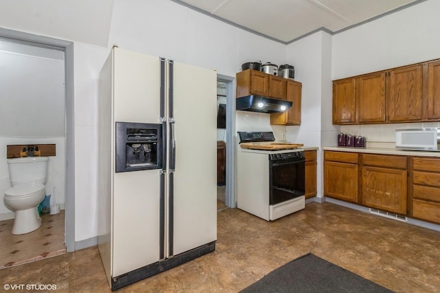 514 W Prairie St, Kirkland, IL 60146 - kitchen with visible vents, brown cabinetry, white appliances, and under cabinet range hood