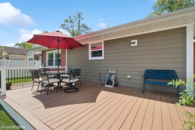 deck with outdoor dining space