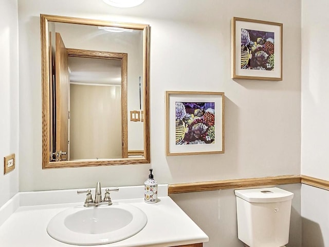 half bath with toilet and vanity