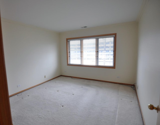 9514 S Kilbourn Ave Unit 3B, Oak Lawn, IL 60453 - unfurnished room with crown molding, visible vents, baseboards, and light carpet