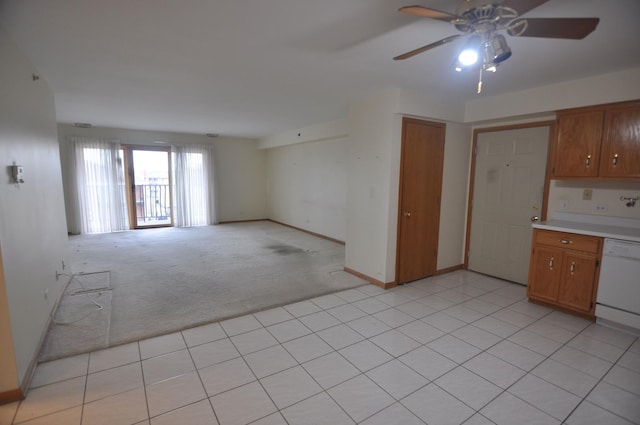9514 S Kilbourn Ave Unit 3B, Oak Lawn, IL 60453 - kitchen featuring ceiling fan, light colored carpet, light countertops, white dishwasher, and brown cabinets