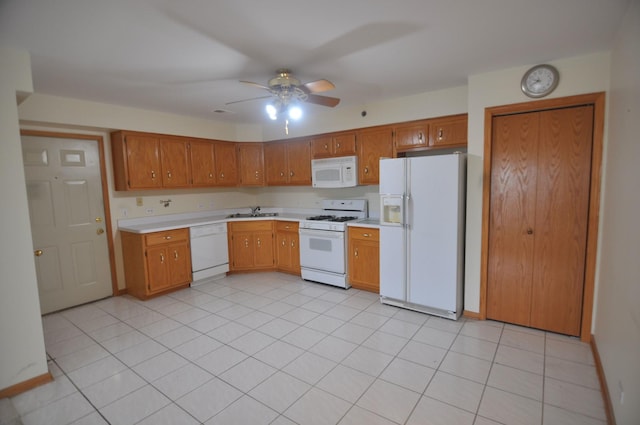 9514 S Kilbourn Ave Unit 3B, Oak Lawn, IL 60453 - kitchen featuring white appliances, light countertops, a ceiling fan, and brown cabinets