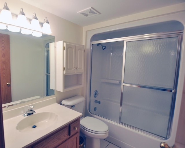 9514 S Kilbourn Ave Unit 3B, Oak Lawn, IL 60453 - full bathroom with visible vents, combined bath / shower with glass door, toilet, vanity, and tile patterned flooring