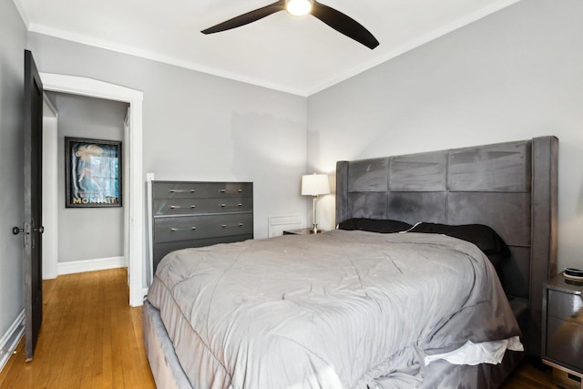1606 W Winona St Unit 3, Chicago, IL 60640 - bedroom with a ceiling fan, wood finished floors, baseboards, and ornamental molding