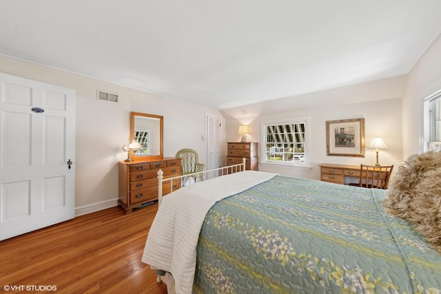 3916 Franklin Ave, Western Springs, IL 60558 - bedroom featuring wood finished floors, baseboards, and visible vents