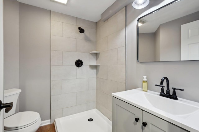 18485 W Springwood Dr, Grayslake, IL 60030 - full bathroom with a tile shower, toilet, and vanity