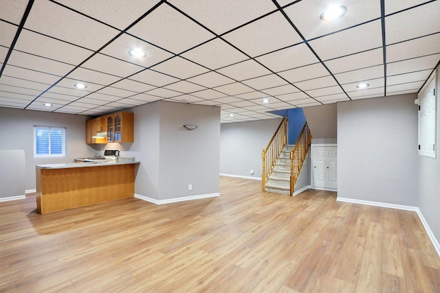 18485 W Springwood Dr, Grayslake, IL 60030 - bar with stairs, baseboards, light wood-style floors, stove, and recessed lighting