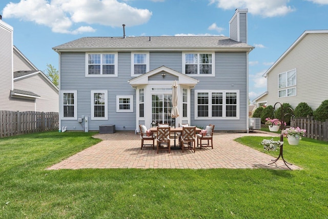 18485 W Springwood Dr, Grayslake, IL 60030 - back of house featuring cooling unit, a patio, and a chimney