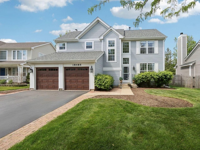 18485 W Springwood Dr, Grayslake, IL 60030 - view of front of home with driveway and a shingled roof