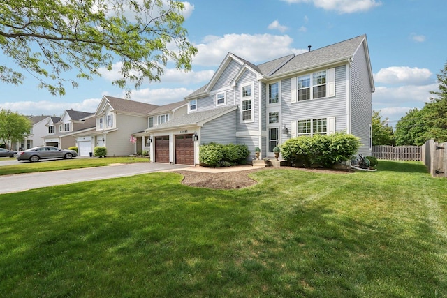 18485 W Springwood Dr, Grayslake, IL 60030 - view of front facade with asphalt driveway and a garage