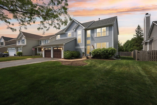 18485 W Springwood Dr, Grayslake, IL 60030 - view of front of property with asphalt driveway and a garage