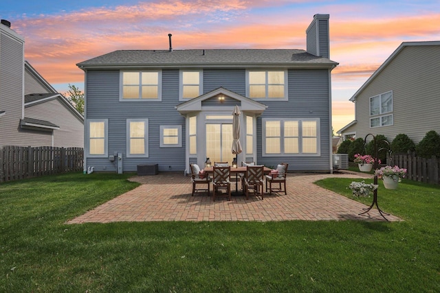 18485 W Springwood Dr, Grayslake, IL 60030 - back of property with cooling unit, a patio area, and a chimney