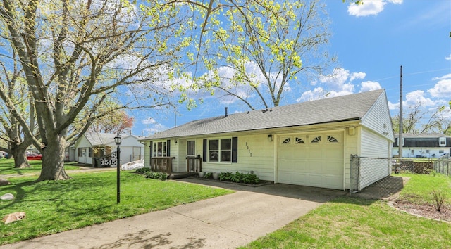 ranch-style home featuring fence, a front yard, roof with shingles, an attached garage, and driveway