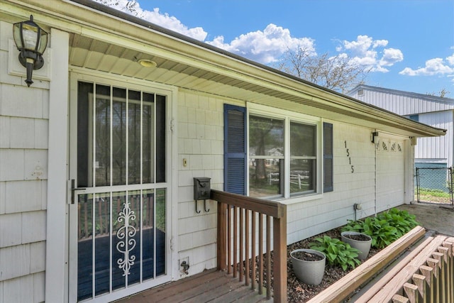 property entrance with a garage