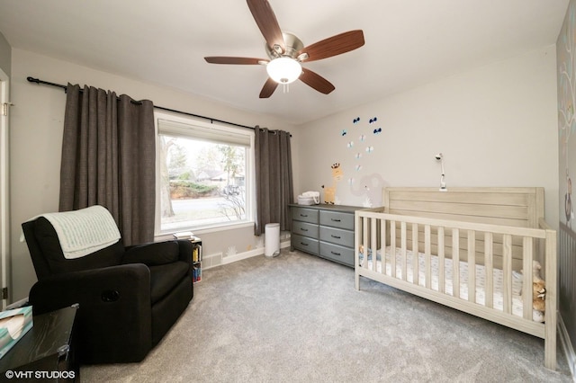 1131 S Hamlin Ave, Park Ridge, IL 60068 - bedroom featuring carpet, a crib, and ceiling fan