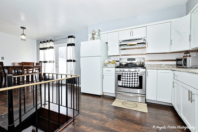 43 Lippincott Rd, Fox Lake, IL 60020 - kitchen featuring white cabinets, stainless steel appliances, dark wood-type flooring, and exhaust hood