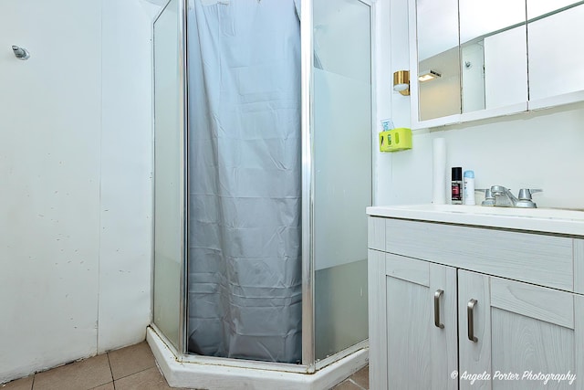 43 Lippincott Rd, Fox Lake, IL 60020 - full bathroom with a shower stall, tile patterned floors, and vanity