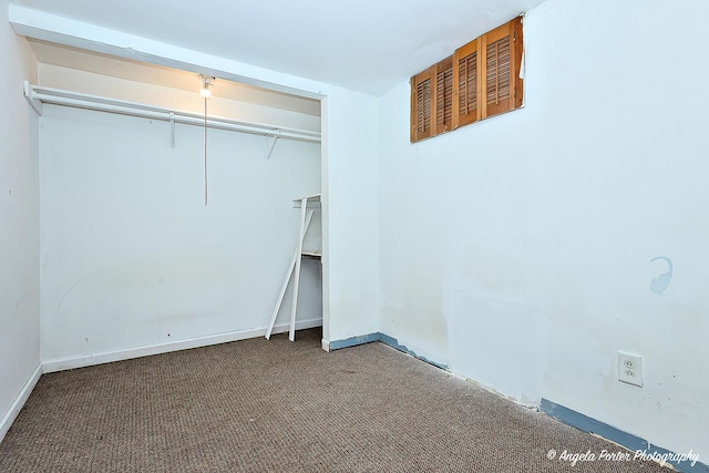 43 Lippincott Rd, Fox Lake, IL 60020 - unfurnished bedroom with a closet, carpet flooring, and baseboards