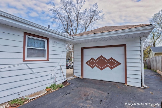43 Lippincott Rd, Fox Lake, IL 60020 - garage with fence and driveway