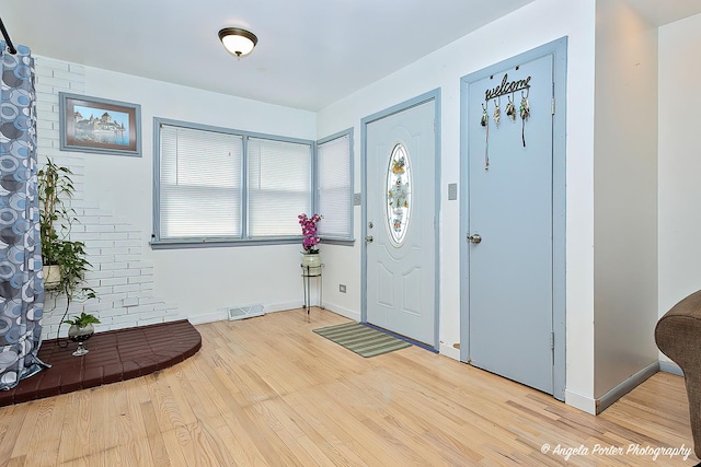 43 Lippincott Rd, Fox Lake, IL 60020 - entryway with baseboards, light wood-style floors, and visible vents