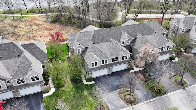 140 River Mist Dr, Oswego, IL 60543 - view of front of property featuring an attached garage, driveway, and a front lawn
