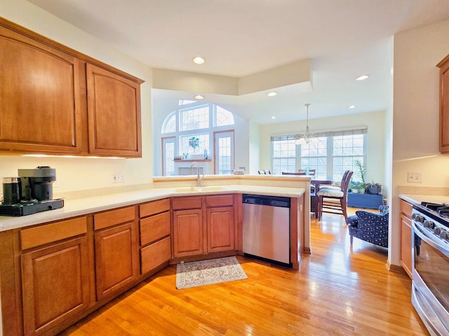 140 River Mist Dr, Oswego, IL 60543 - dining area with light wood-style floors, a chandelier, recessed lighting, and baseboards