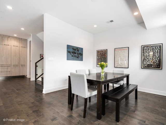 dining space featuring dark wood-style flooring, visible vents, baseboards, and recessed lighting