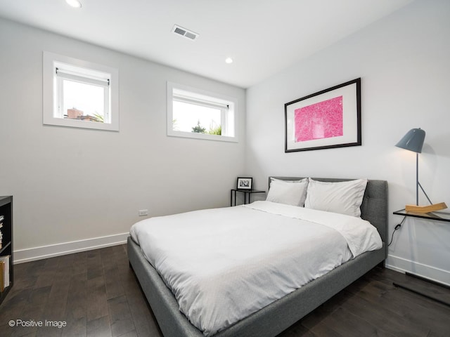 bedroom with visible vents, baseboards, recessed lighting, and dark wood-style floors