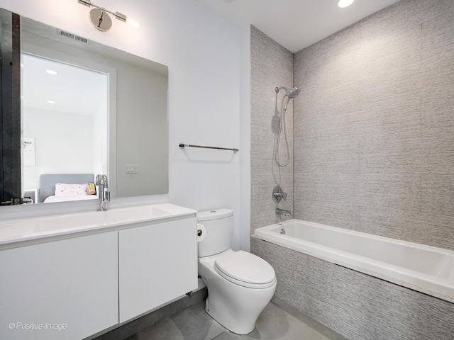 ensuite bathroom featuring vanity, recessed lighting, toilet, tile patterned floors, and shower / bathing tub combination