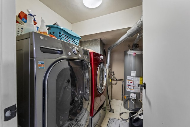 11212 Cottonwood Dr Unit 23A, Palos Hills, IL 60465 - washroom with tile patterned flooring, water heater, washer and clothes dryer, and laundry area