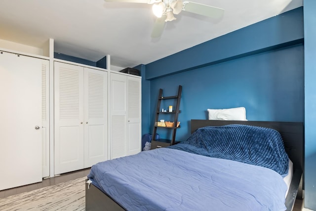 bedroom featuring wood finished floors and a ceiling fan