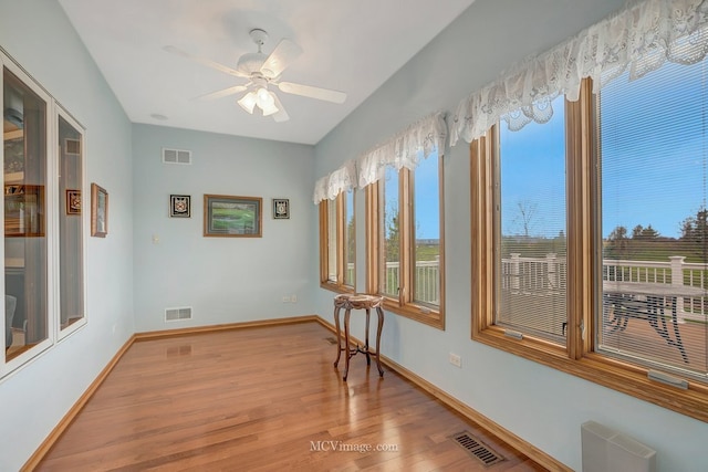 sunroom featuring visible vents