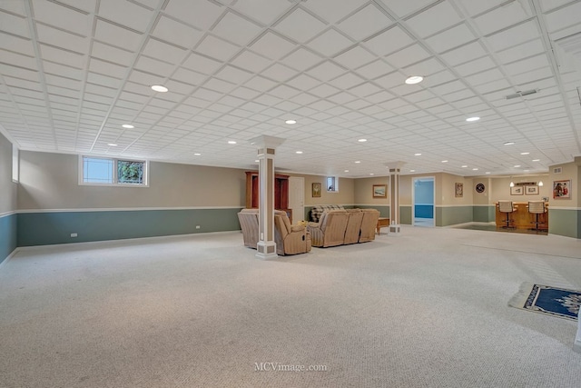 interior space with bar area, recessed lighting, and carpet