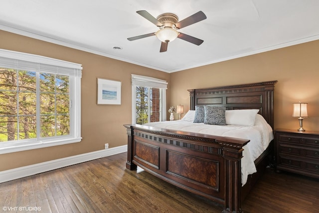 1046 N Hainesville Rd, Round Lake Beach, IL 60073 - bedroom with baseboards, dark wood finished floors, crown molding, and a ceiling fan