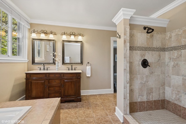 1046 N Hainesville Rd, Round Lake Beach, IL 60073 - bathroom featuring crown molding, tiled shower, double vanity, baseboards, and tile patterned flooring