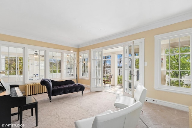 1046 N Hainesville Rd, Round Lake Beach, IL 60073 - sunroom with french doors, carpet floors, baseboards, and ornamental molding