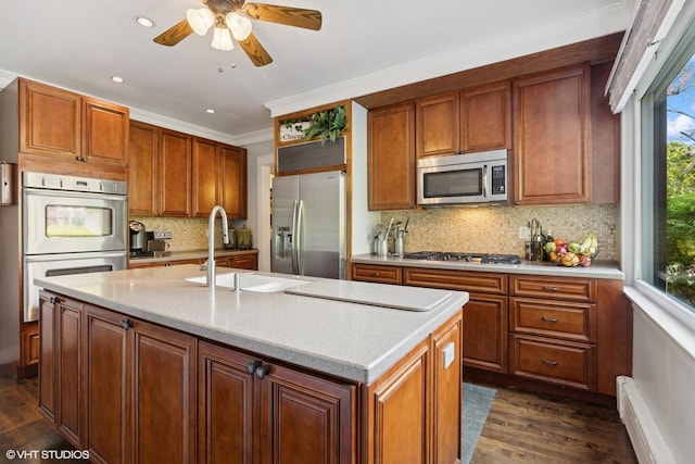 1046 N Hainesville Rd, Round Lake Beach, IL 60073 - kitchen with stainless steel appliances, a sink, healthy amount of natural light, dark wood-style flooring, and recessed lighting