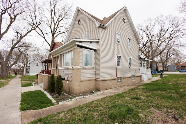 732 N Dearborn Ave, Kankakee, IL 60901 - view of side of home with a yard