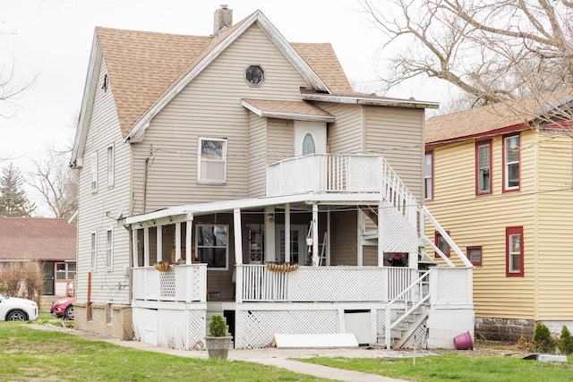 732 N Dearborn Ave, Kankakee, IL 60901 - view of front facade featuring stairway, roof with shingles, and a chimney