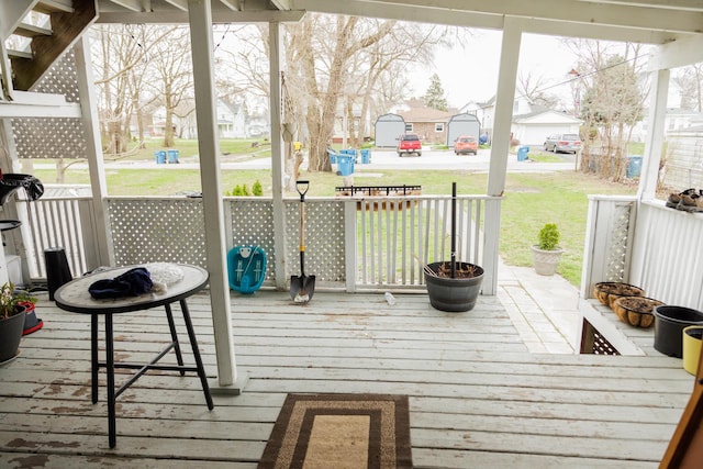 732 N Dearborn Ave, Kankakee, IL 60901 - wooden terrace with a residential view and a lawn