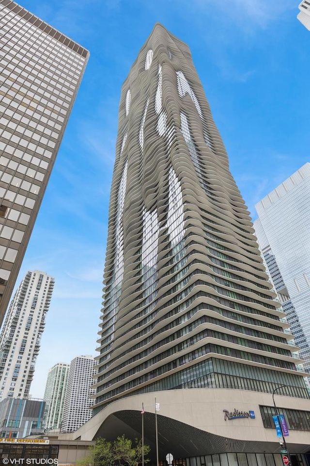 view of building exterior featuring a view of city