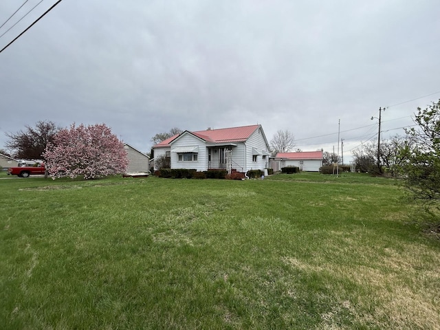 2411 S State St, Westville, IL 61883 - view of front of home featuring a front yard and metal roof
