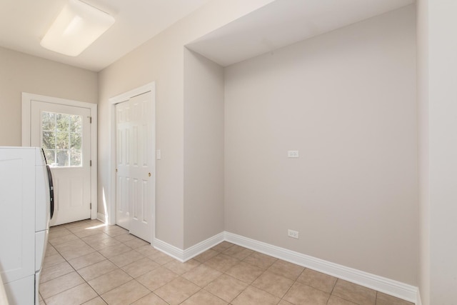 6433 Davidson Ct, Gurnee, IL 60031 - washroom with light tile patterned floors, washer / dryer, and baseboards
