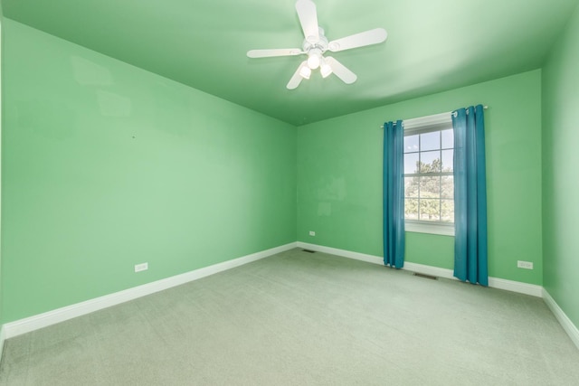 6433 Davidson Ct, Gurnee, IL 60031 - carpeted empty room with baseboards and a ceiling fan