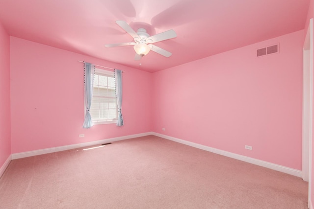 6433 Davidson Ct, Gurnee, IL 60031 - empty room featuring light carpet, a ceiling fan, and baseboards